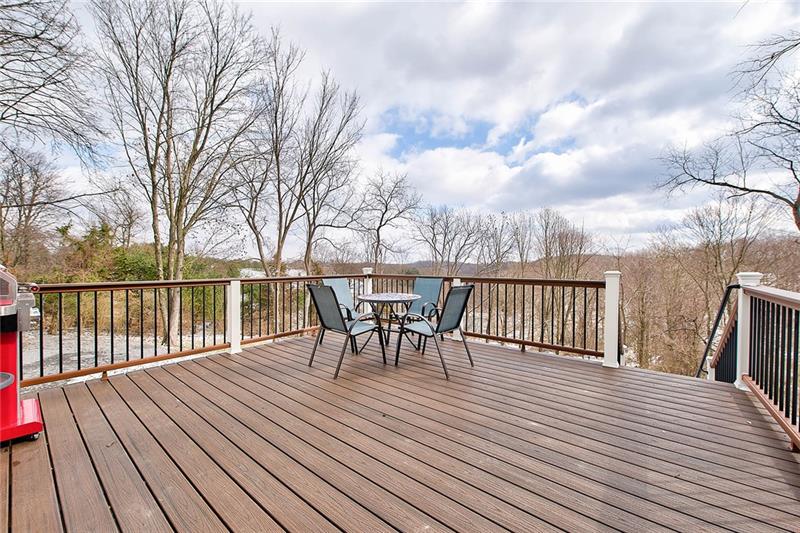 163 Camp Meeting Rd Extension Sewickley, PA 15143 - Photo 22 of 25 Even the deck railing and stairs down to the backyard are no-maintenance.