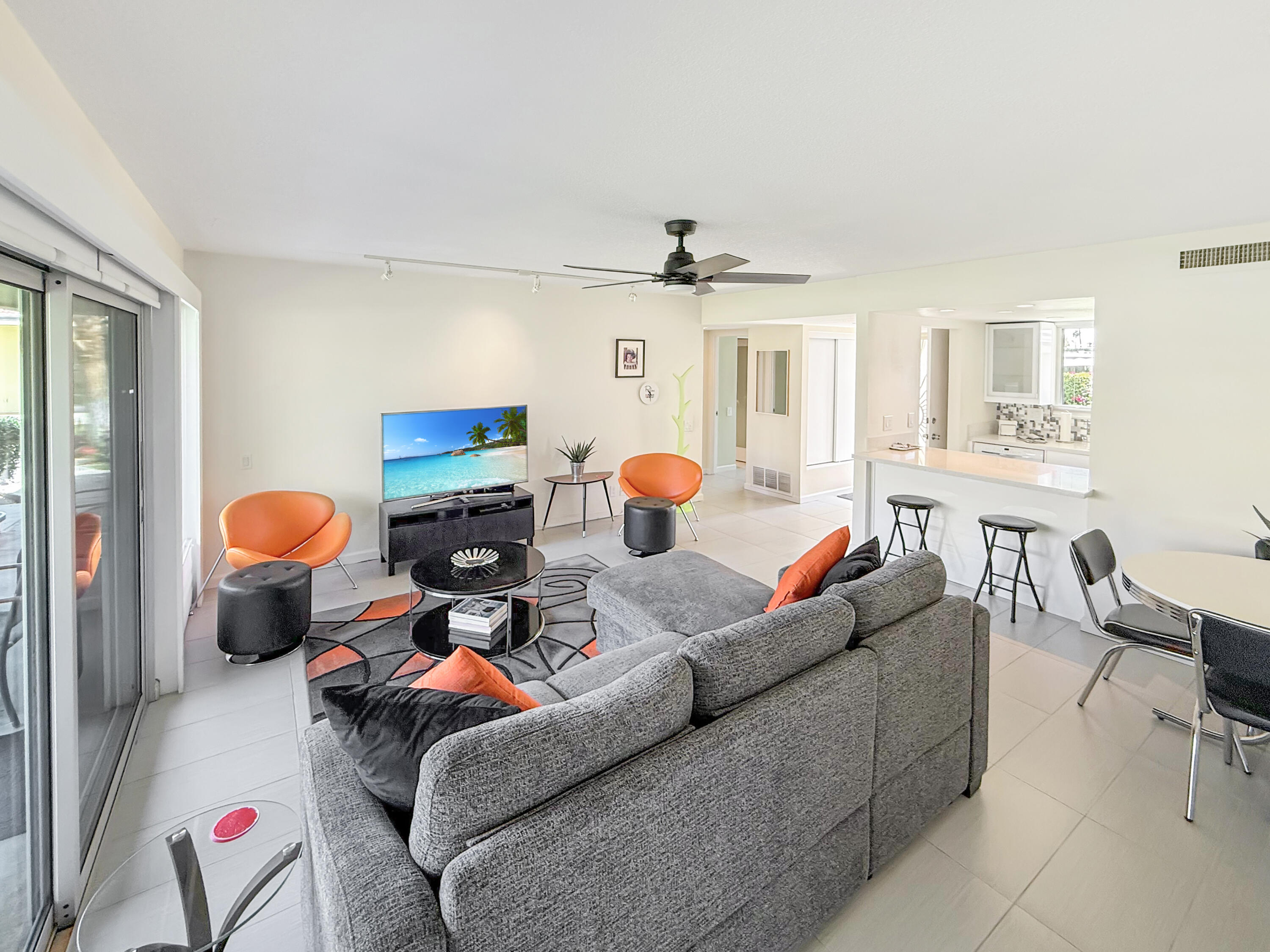 1881 South Araby Drive, Unit 16 Palm Springs, CA 92264 - Photo 12 of 52 a living room with furniture and kitchen view