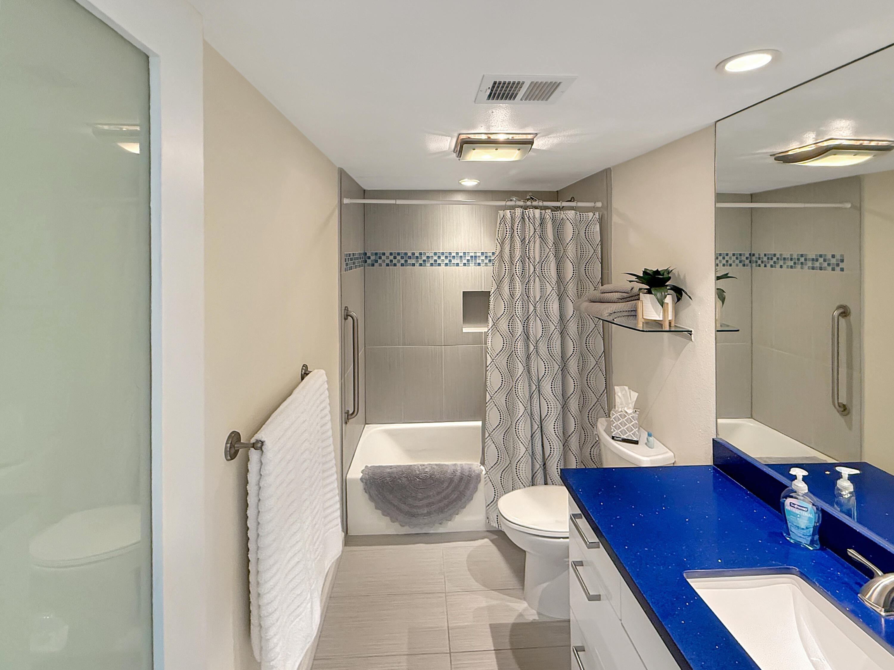 1881 South Araby Drive, Unit 16 Palm Springs, CA 92264 - Photo 17 of 52 a spacious bathroom with a tub toilet and a shower