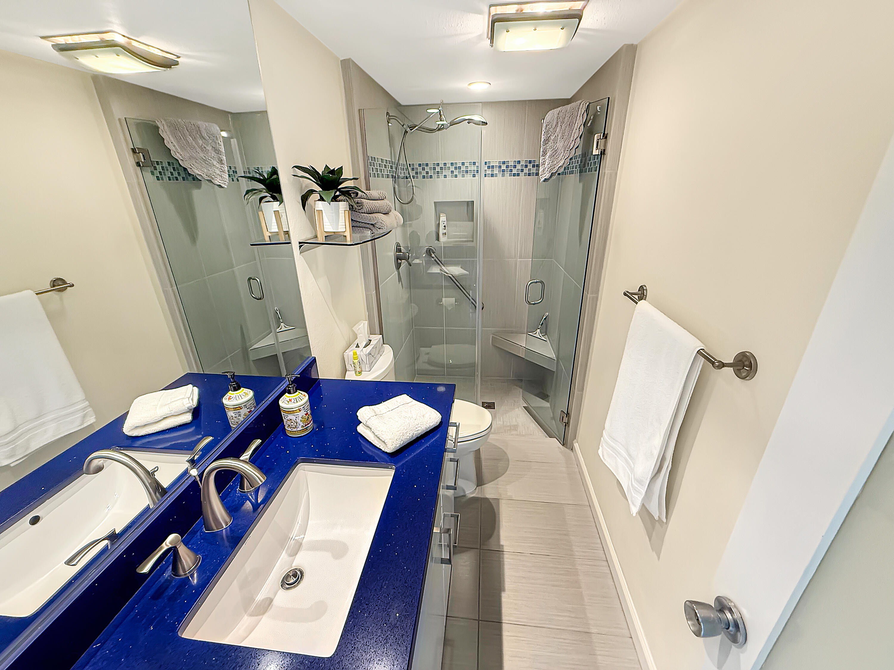 1881 South Araby Drive, Unit 16 Palm Springs, CA 92264 - Photo 27 of 52 a bathroom with a sink toilet and shower