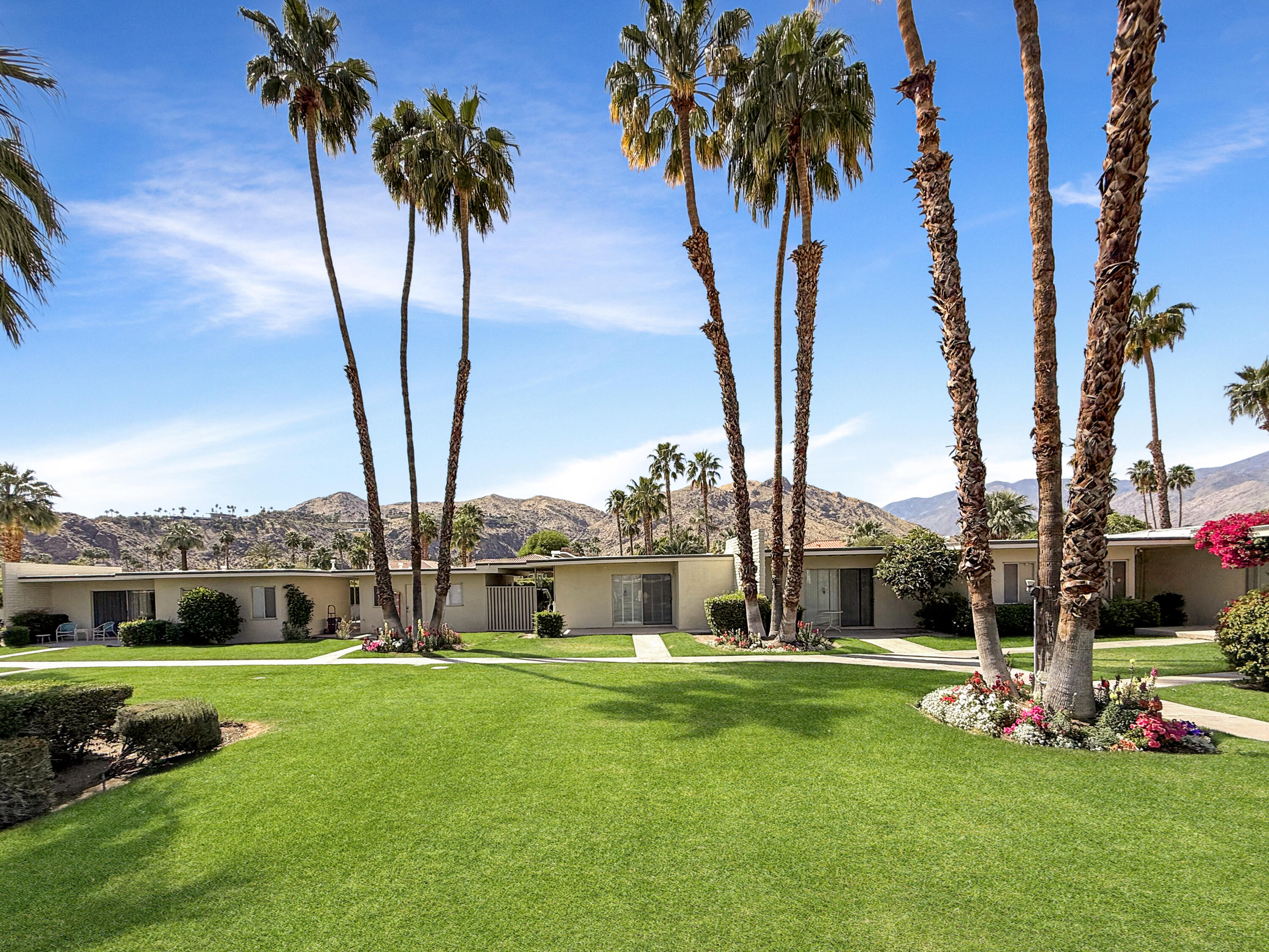 1881 South Araby Drive, Unit 16 Palm Springs, CA 92264 - Photo 33 of 52 a view of a park with palm trees