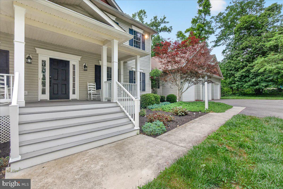 2516 Daisy Road Woodbine, MD 21797 - Photo 5 of 78 Charming entrance with lush greenery.