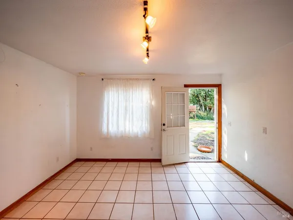 a view of an empty room and window