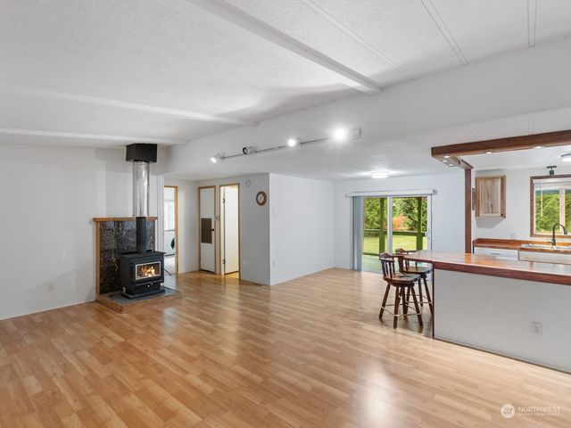 a view of kitchen with furniture and a window