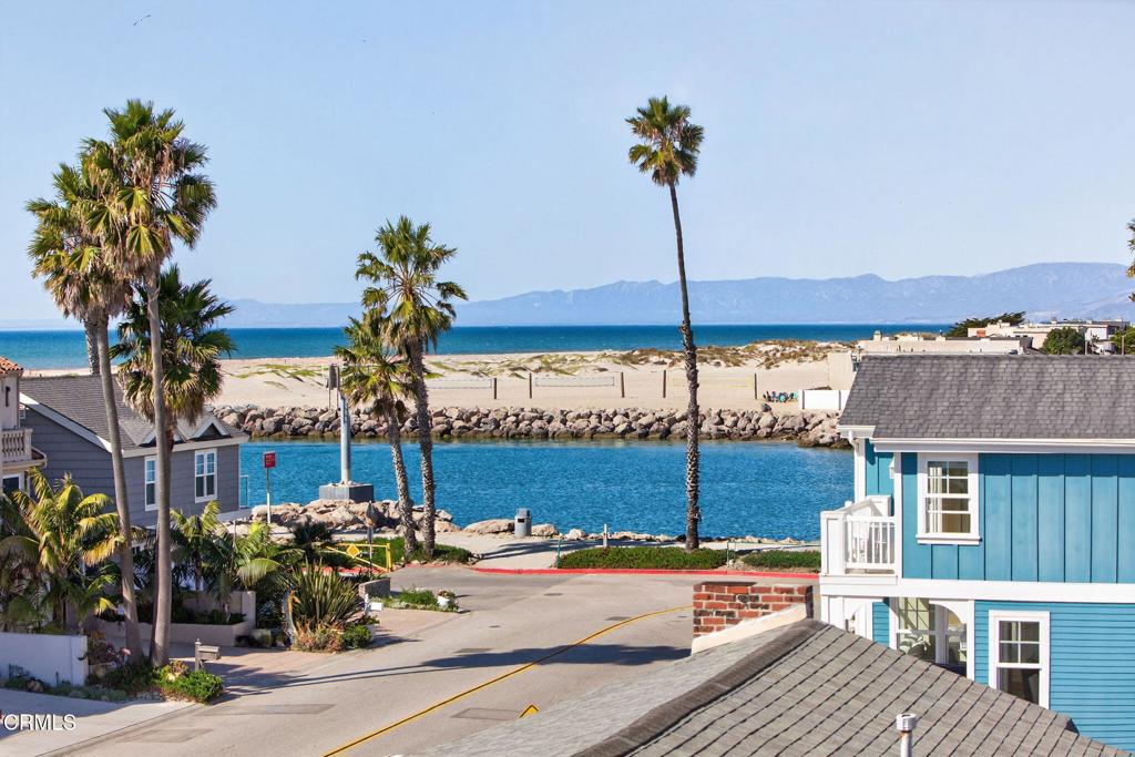 2408 Ocean Drive Oxnard, CA 93035 - Photo 7 of 58 a view of a patio with a table and chairs