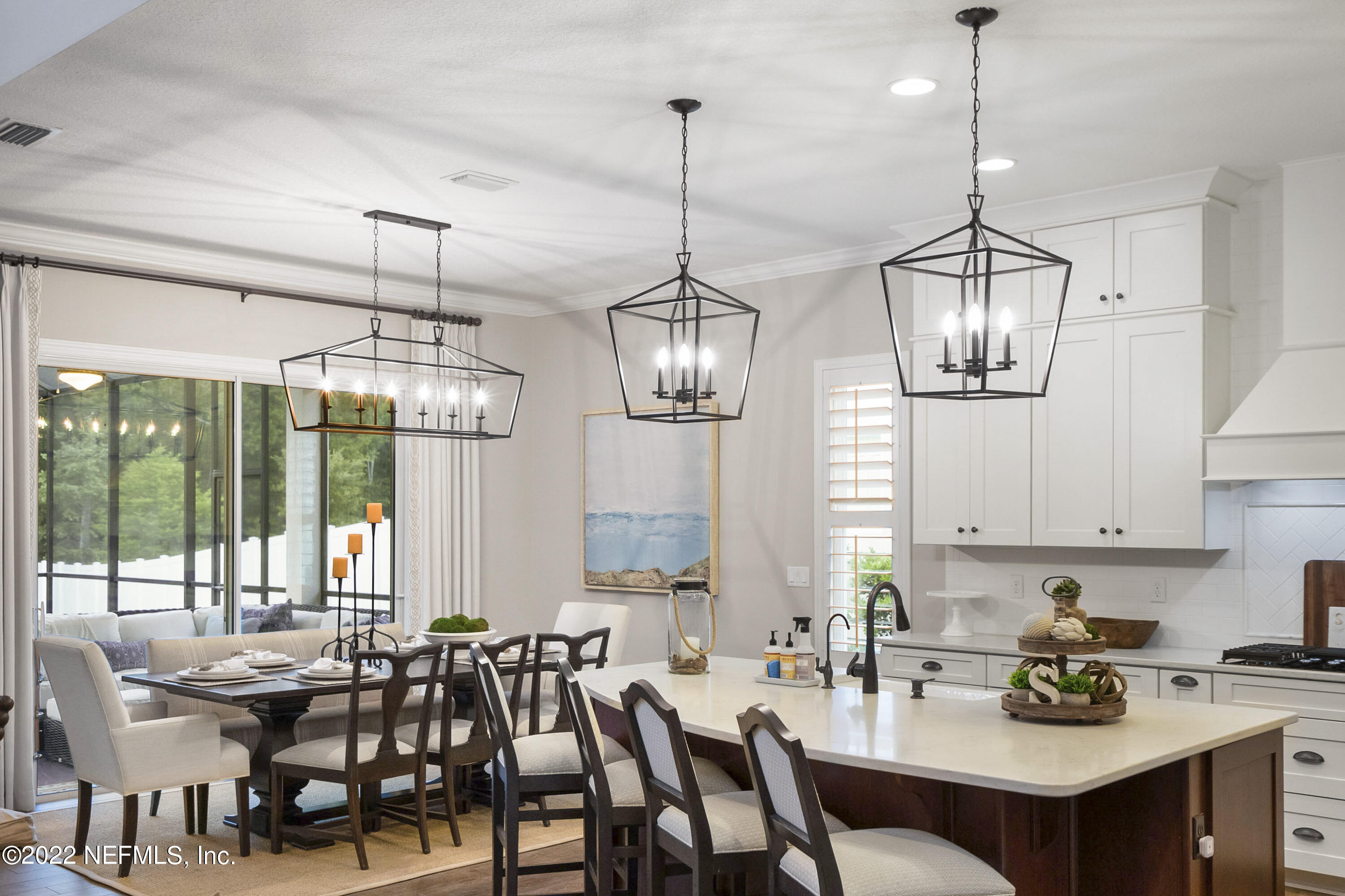 126 Broadleaf Lane St. Johns, FL 32259 - Photo 23 of 70 a view of a dining room with furniture window and outside view
