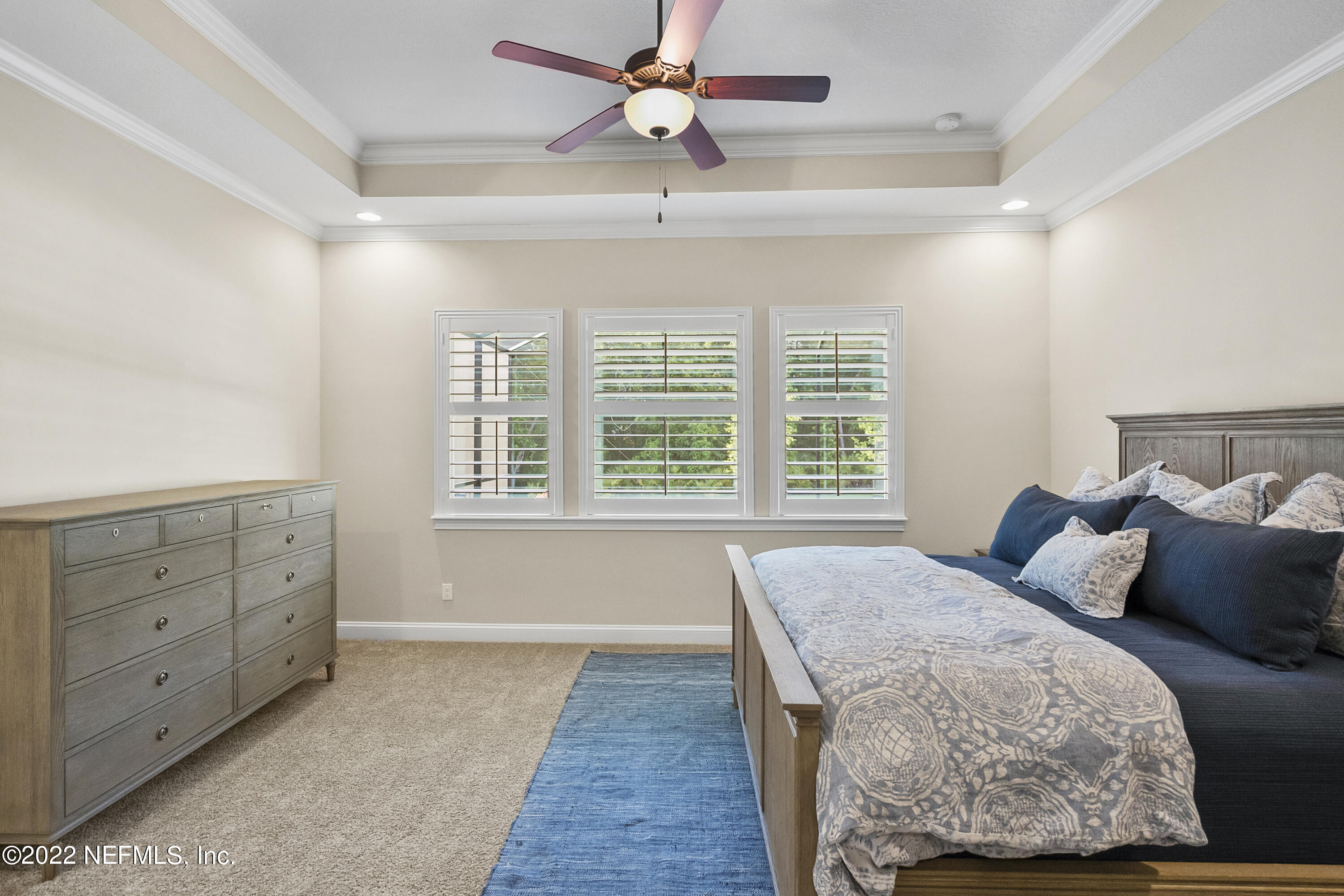 126 Broadleaf Lane St. Johns, FL 32259 - Photo 28 of 70 a bedroom with a bed and a dresser