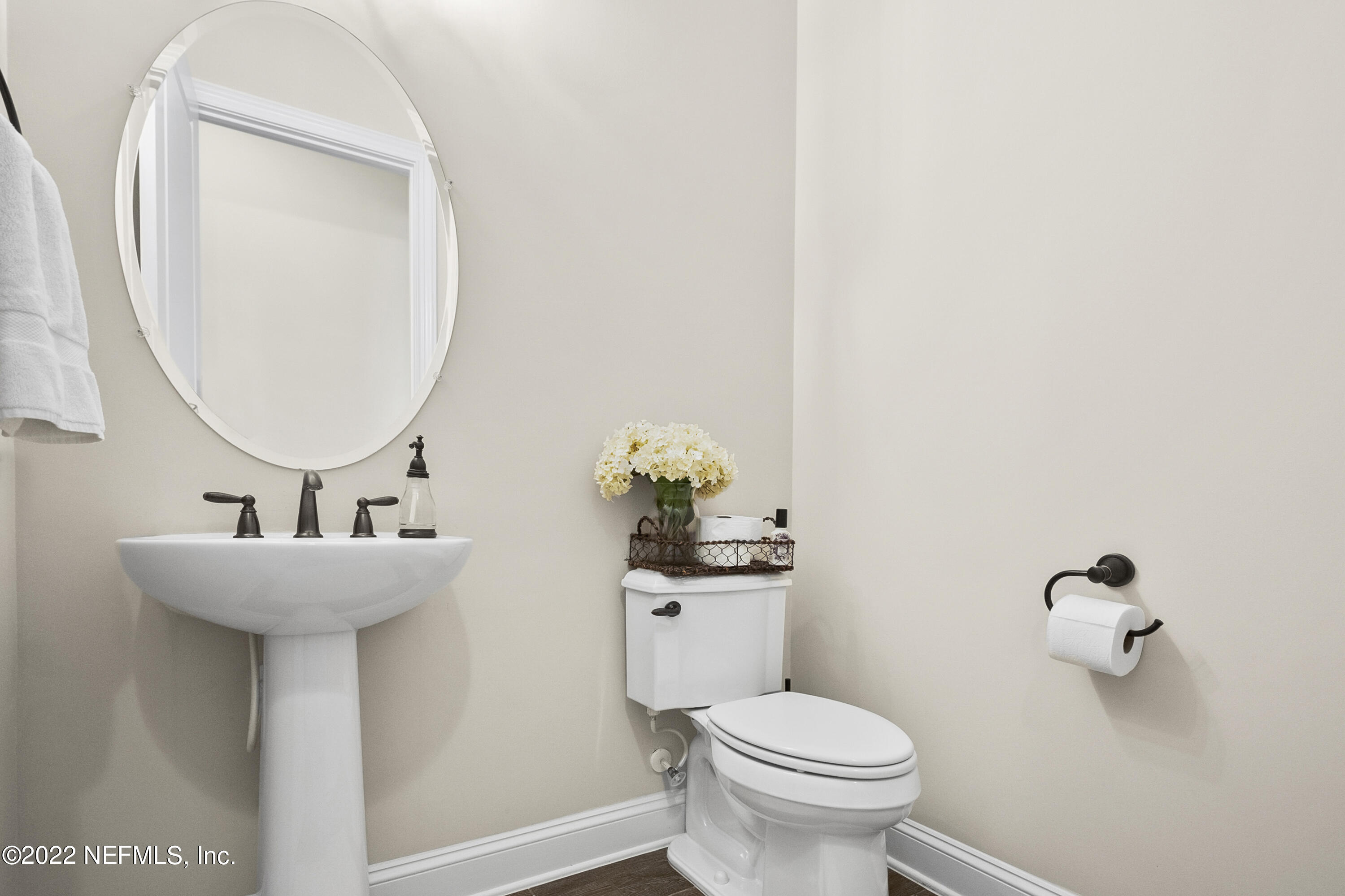 126 Broadleaf Lane St. Johns, FL 32259 - Photo 31 of 70 a bathroom with a sink mirror and toilet