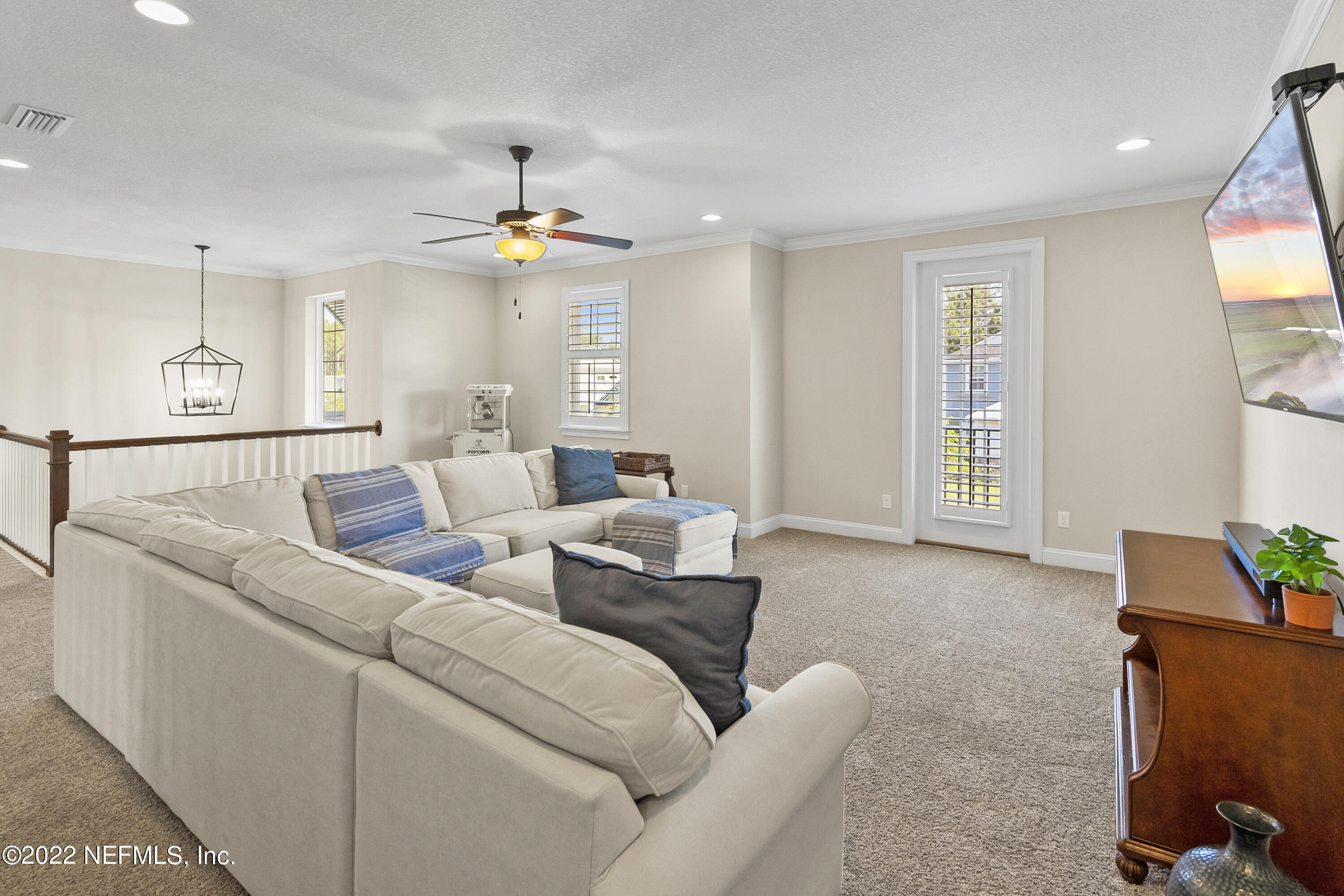 126 Broadleaf Lane St. Johns, FL 32259 - Photo 35 of 70 a living room with furniture and a window