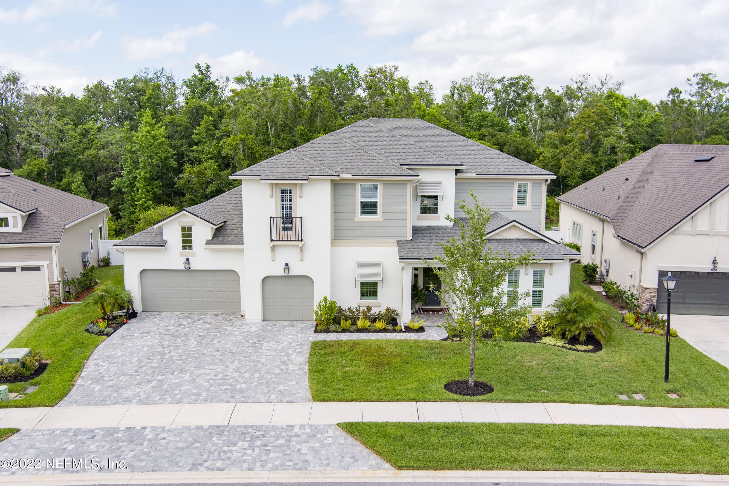 126 Broadleaf Lane St. Johns, FL 32259 - Photo 45 of 70 a front view of a house with a yard