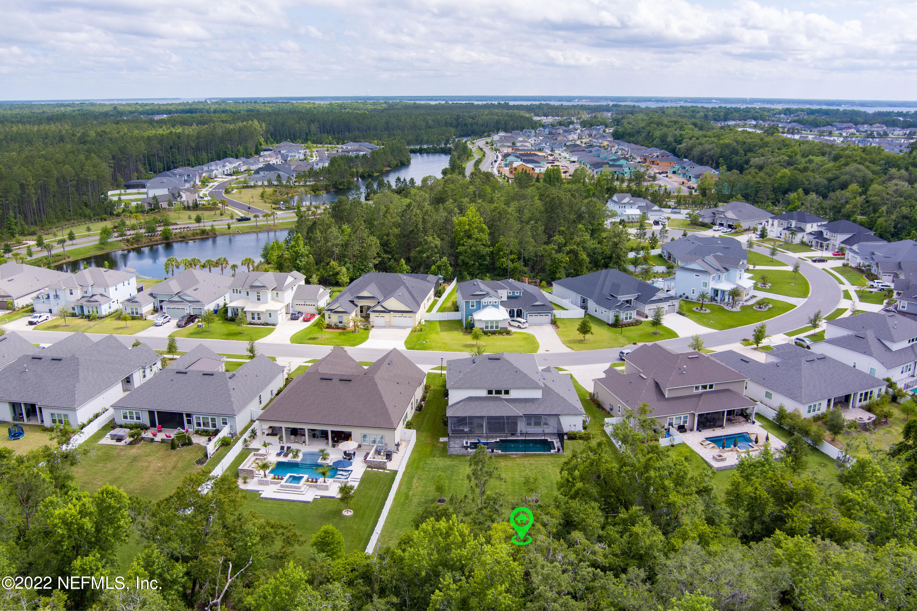 126 Broadleaf Lane St. Johns, FL 32259 - Photo 50 of 70 an aerial view of residential houses with outdoor space and swimming pool