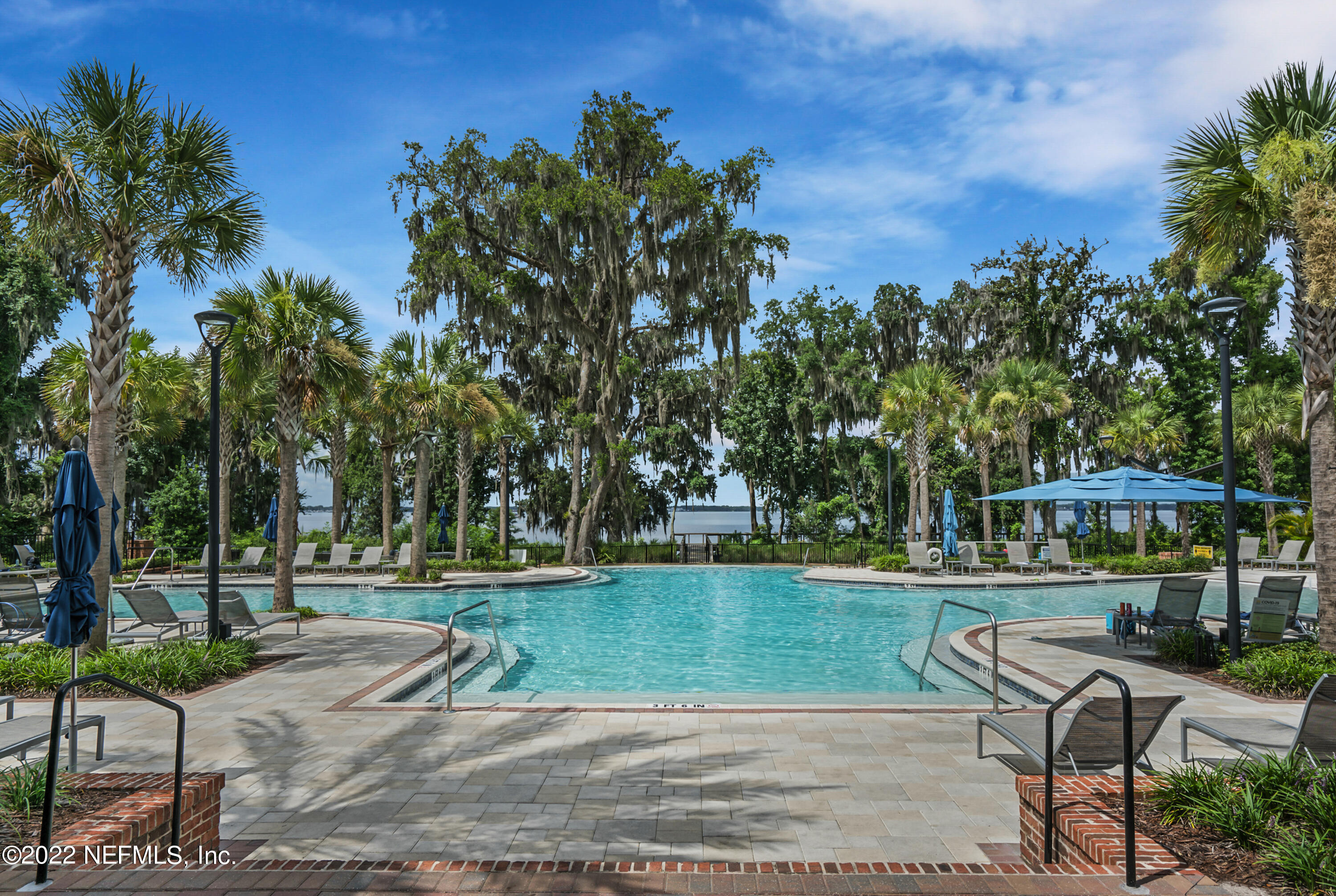 126 Broadleaf Lane St. Johns, FL 32259 - Photo 59 of 70 a view of a swimming pool with a patio and a yard
