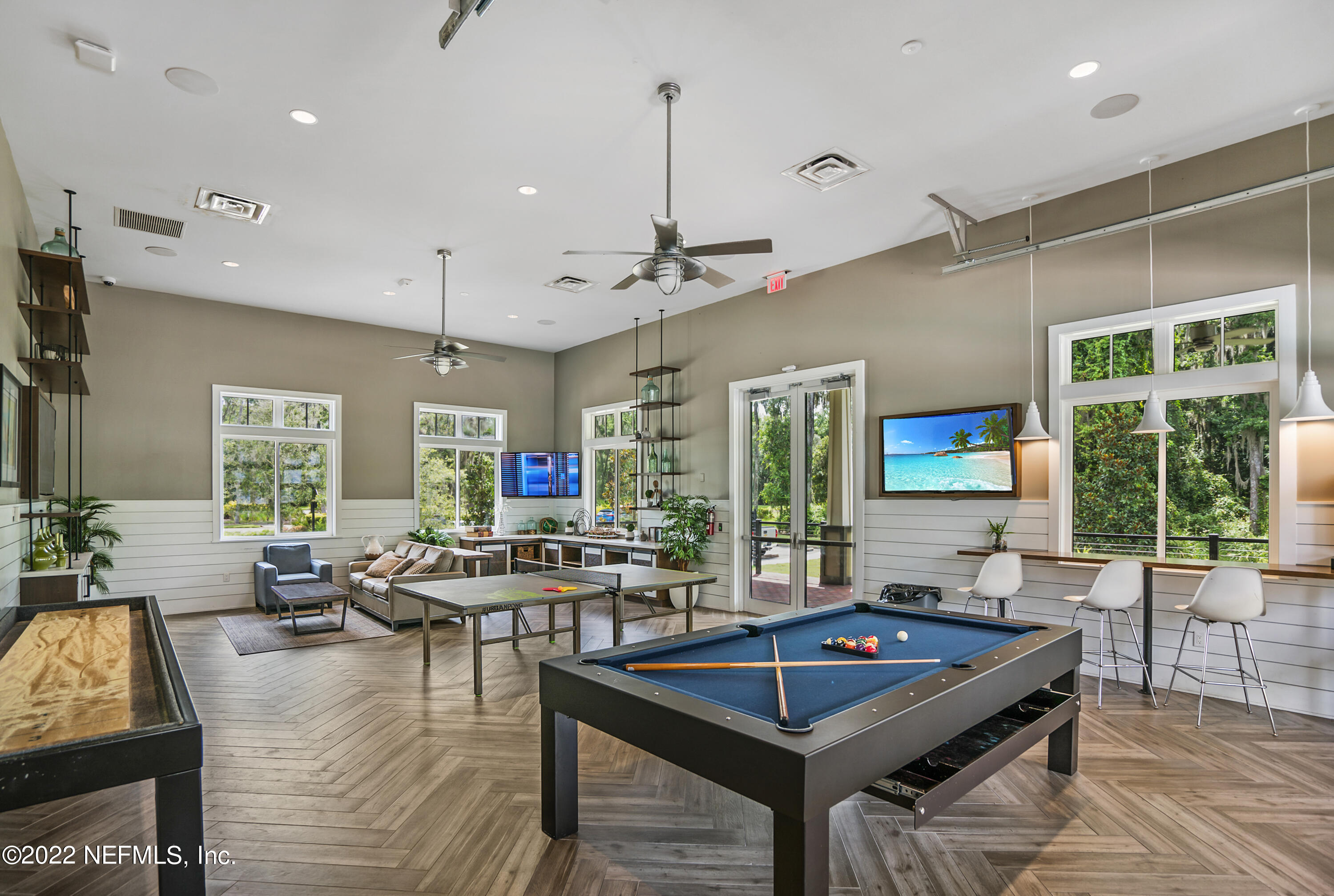 126 Broadleaf Lane St. Johns, FL 32259 - Photo 61 of 70 a living room with furniture pool table and a large window