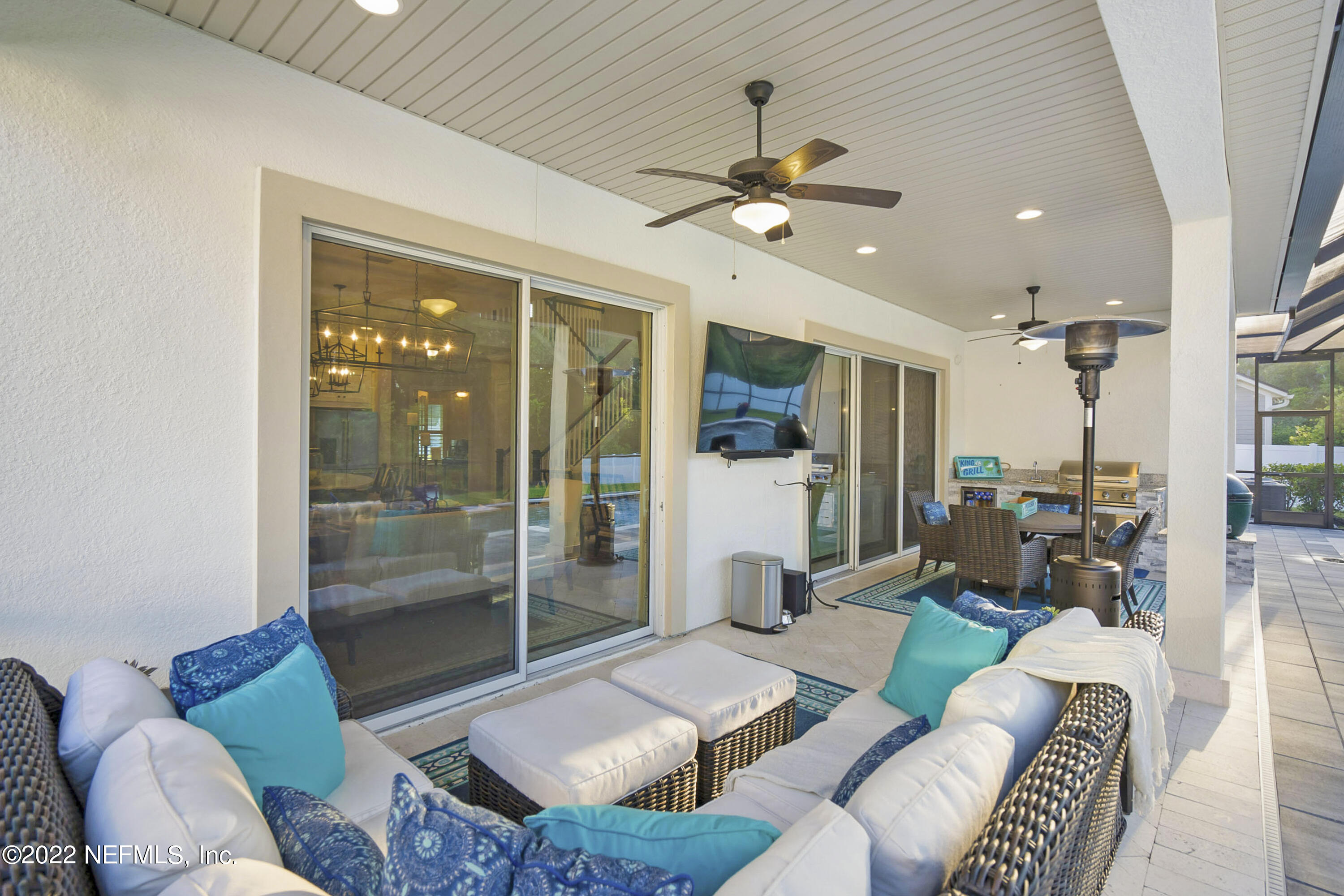 126 Broadleaf Lane St. Johns, FL 32259 - Photo 10 of 70 a living room with furniture and a glass door