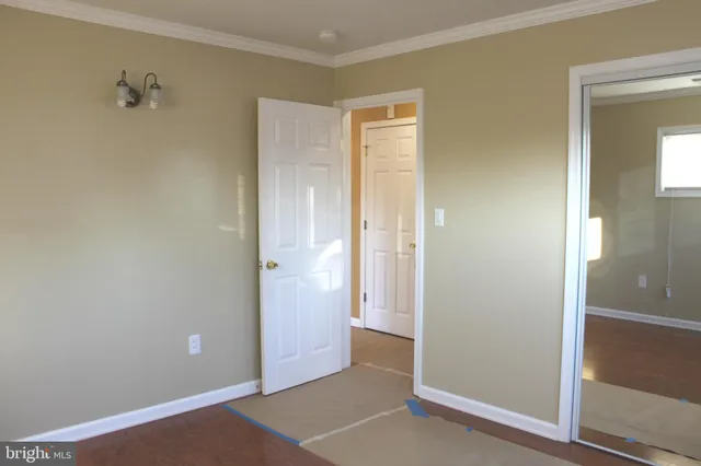 an empty room with closet