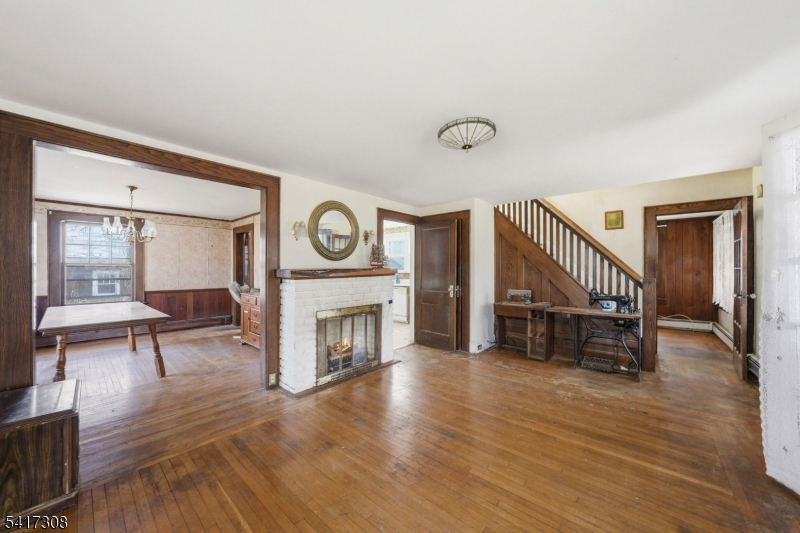 610 Watchung Road Bound Brook, NJ 08805 - Photo 17 of 45 a living room with furniture and a fireplace