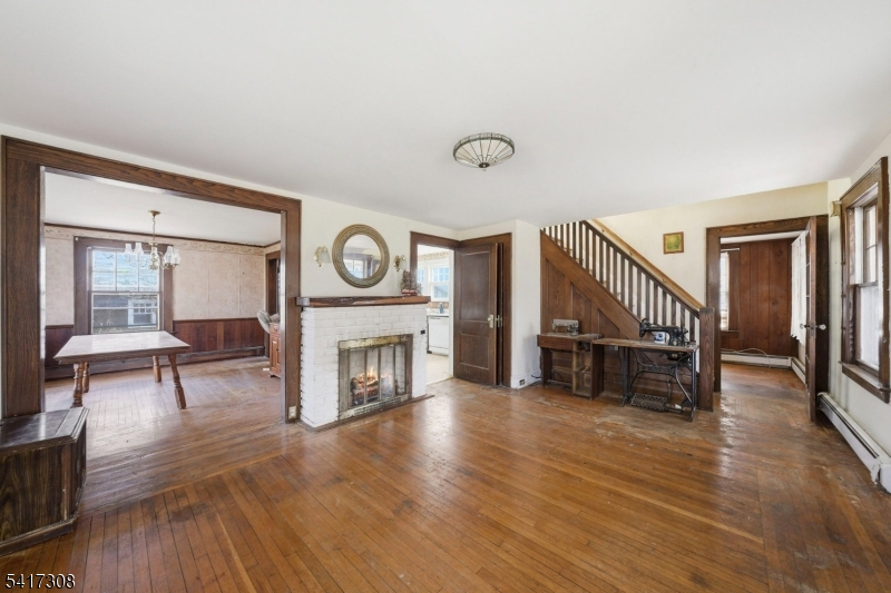 610 Watchung Road Bound Brook, NJ 08805 - Photo 20 of 45 a living room with furniture and a fireplace