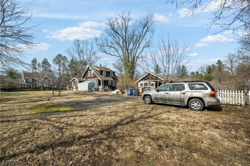 610 Watchung Road Bound Brook, NJ 08805 - Photo 34 of 45 a view of yard with car parked