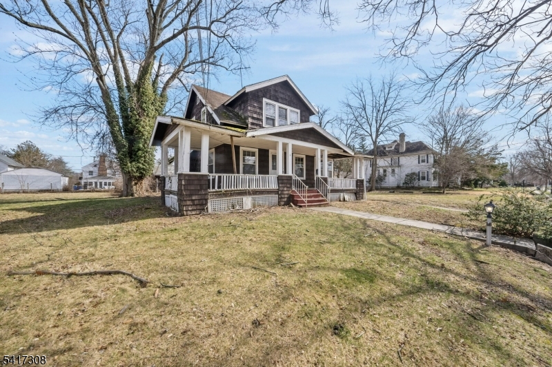 610 Watchung Road Bound Brook, NJ 08805 - Photo 36 of 45 a front view of a house with a yard