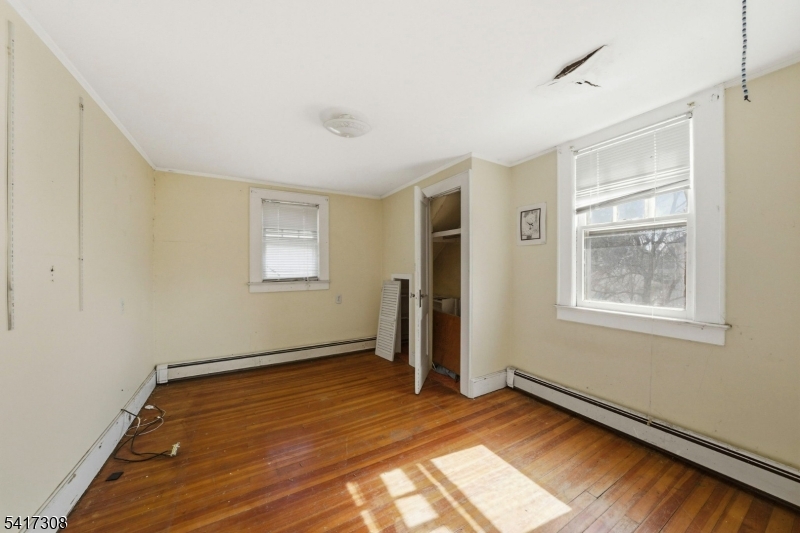 610 Watchung Road Bound Brook, NJ 08805 - Photo 4 of 45 a view of an empty room and window