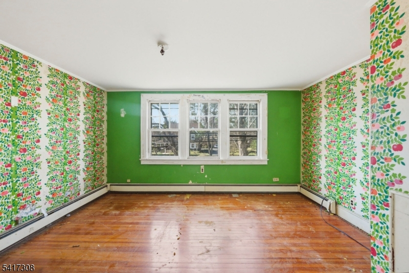 610 Watchung Road Bound Brook, NJ 08805 - Photo 7 of 45 a view of room with window and stairs