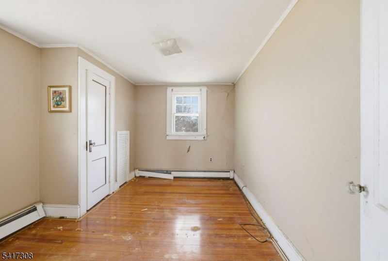610 Watchung Road Bound Brook, NJ 08805 - Photo 10 of 45 a view of a room that has a window in it