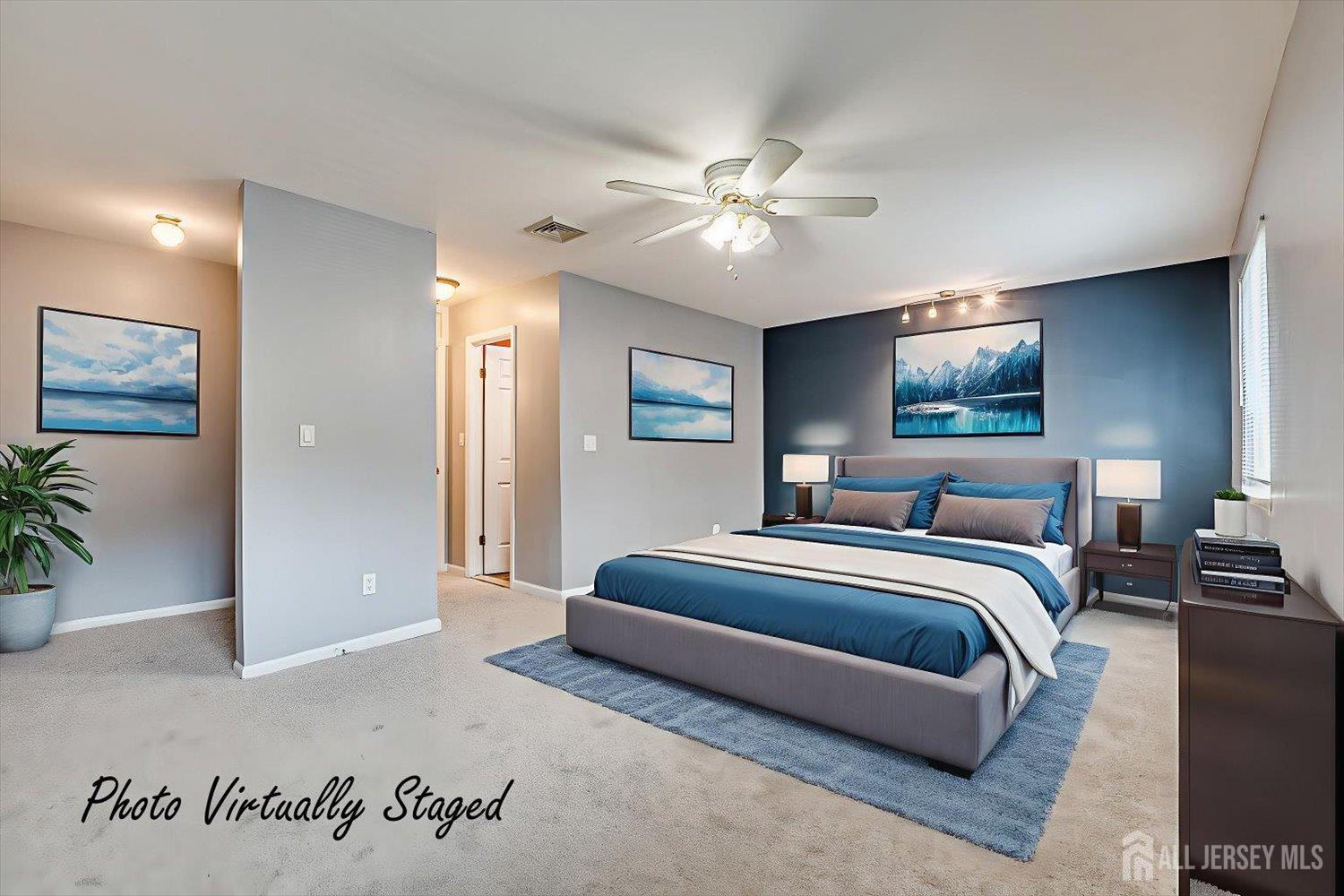 6 Tulip Court Edison, NJ 08820 - Photo 24 of 46 a spacious bedroom with a large bed and a chandelier