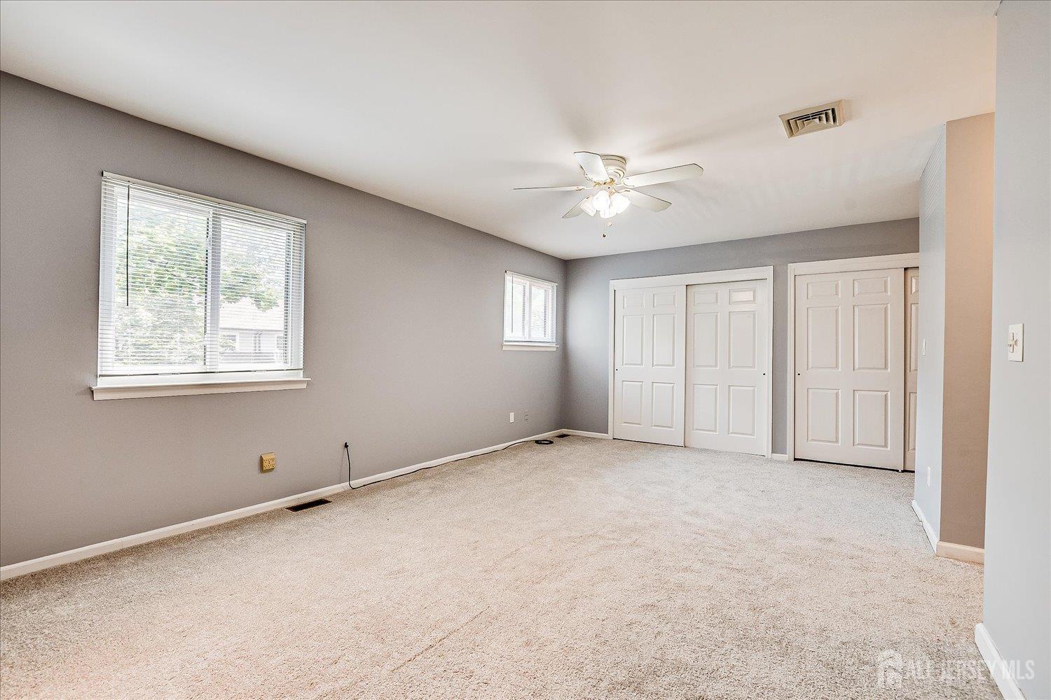 6 Tulip Court Edison, NJ 08820 - Photo 26 of 46 a view of an empty room with a window