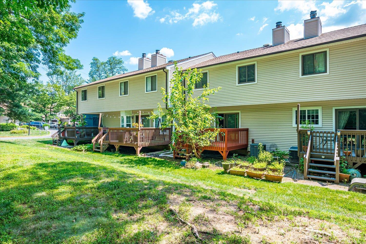 6 Tulip Court Edison, NJ 08820 - Photo 38 of 46 a view of a house with a yard porch and sitting area