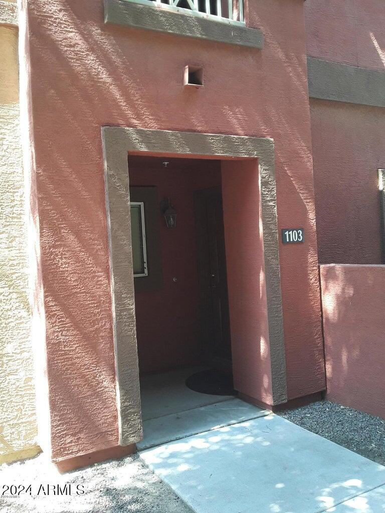 a view of a brick house with a door