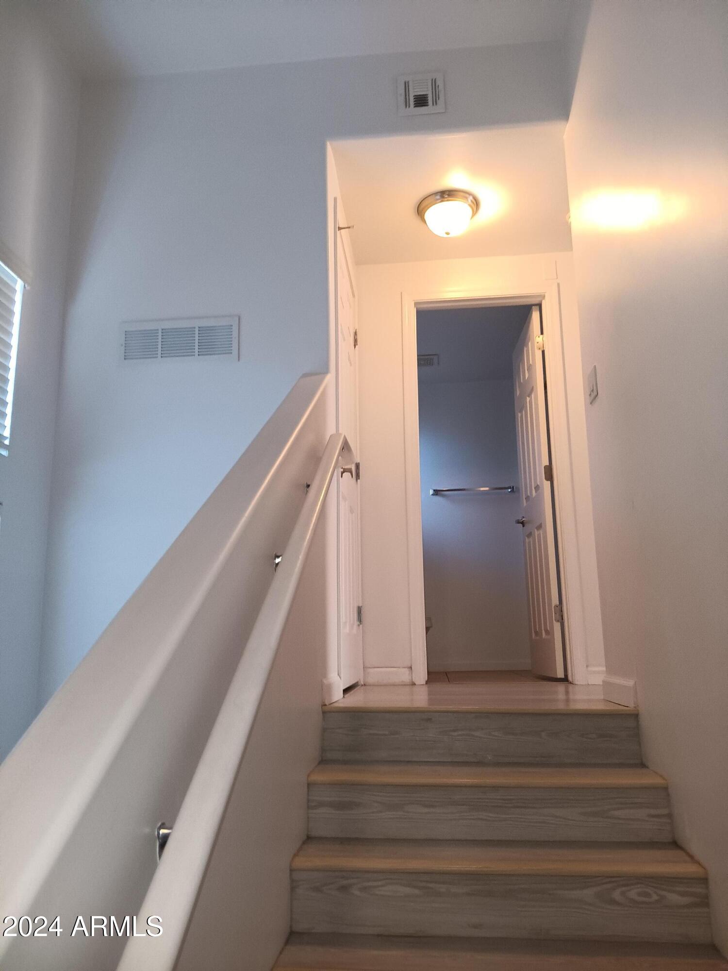 1920 East Bell Road, Unit 1103 Phoenix, AZ 85022 - Photo 15 of 29 a view of entryway and hall with a front door