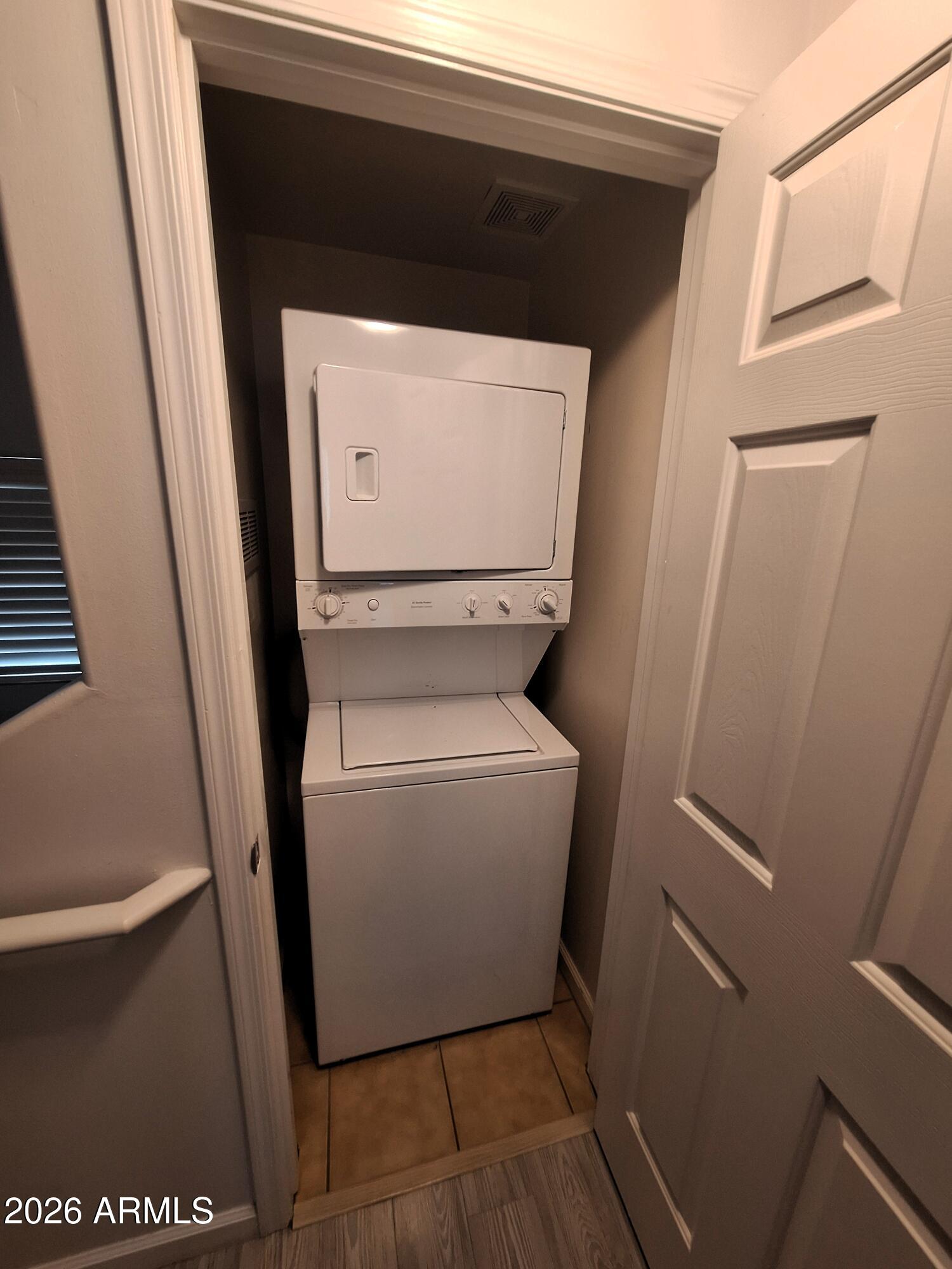 1920 East Bell Road, Unit 1103 Phoenix, AZ 85022 - Photo 16 of 29 a utility room with dryer and washer