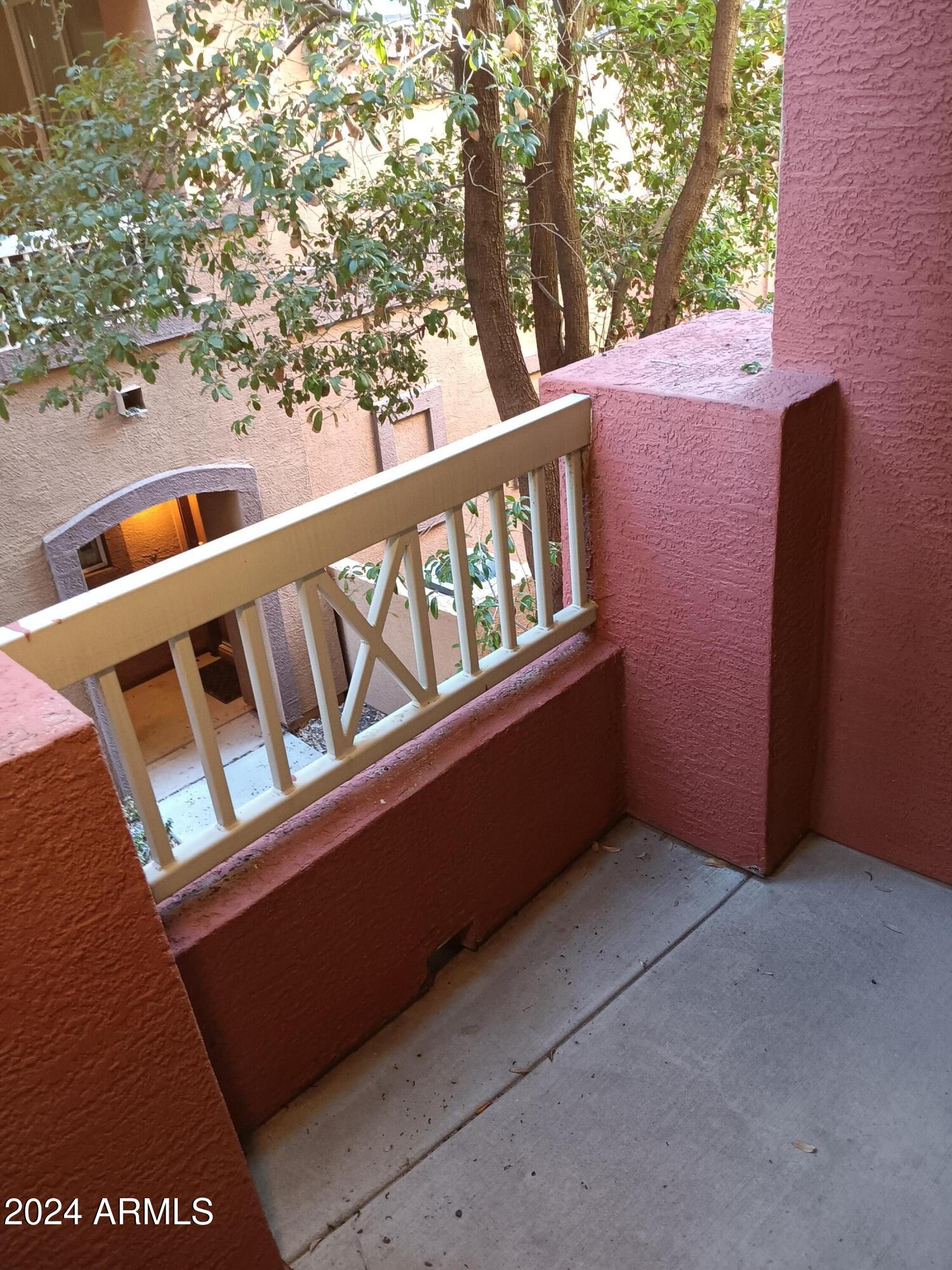 1920 East Bell Road, Unit 1103 Phoenix, AZ 85022 - Photo 28 of 29 a balcony with view of an outdoor space