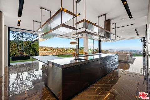 a view of swimming pool with outdoor seating