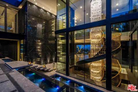 a outdoor living space with furniture and a fireplace