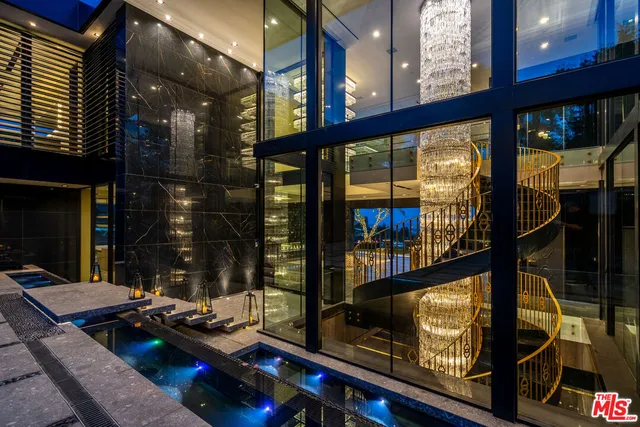 a outdoor living space with furniture and a fireplace