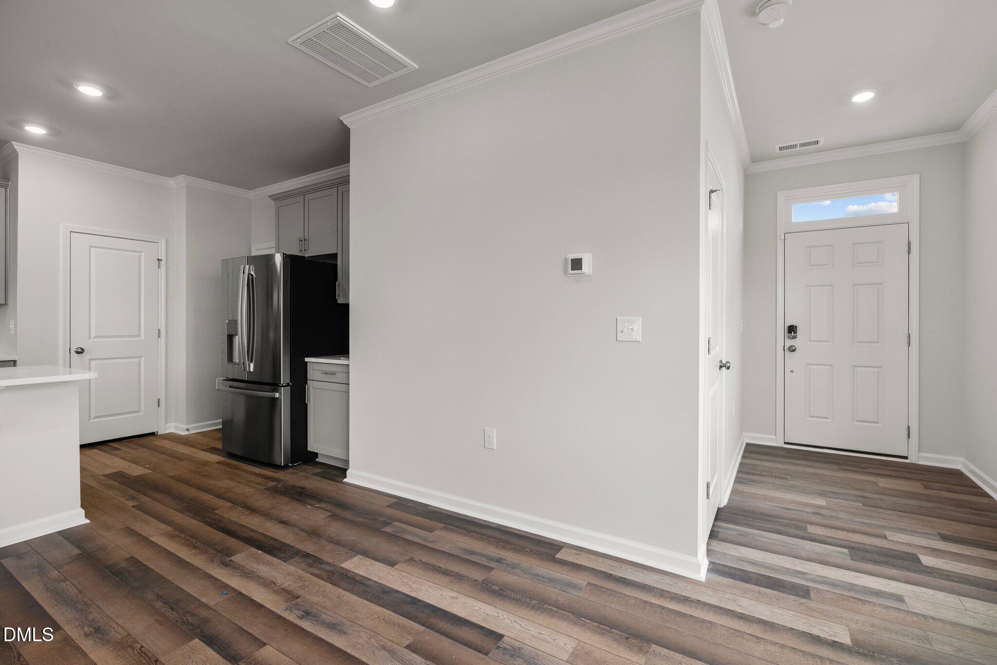 5031 Kota Street Raleigh, NC 27610 - Photo 18 of 84 a view of a livingroom from a hallway