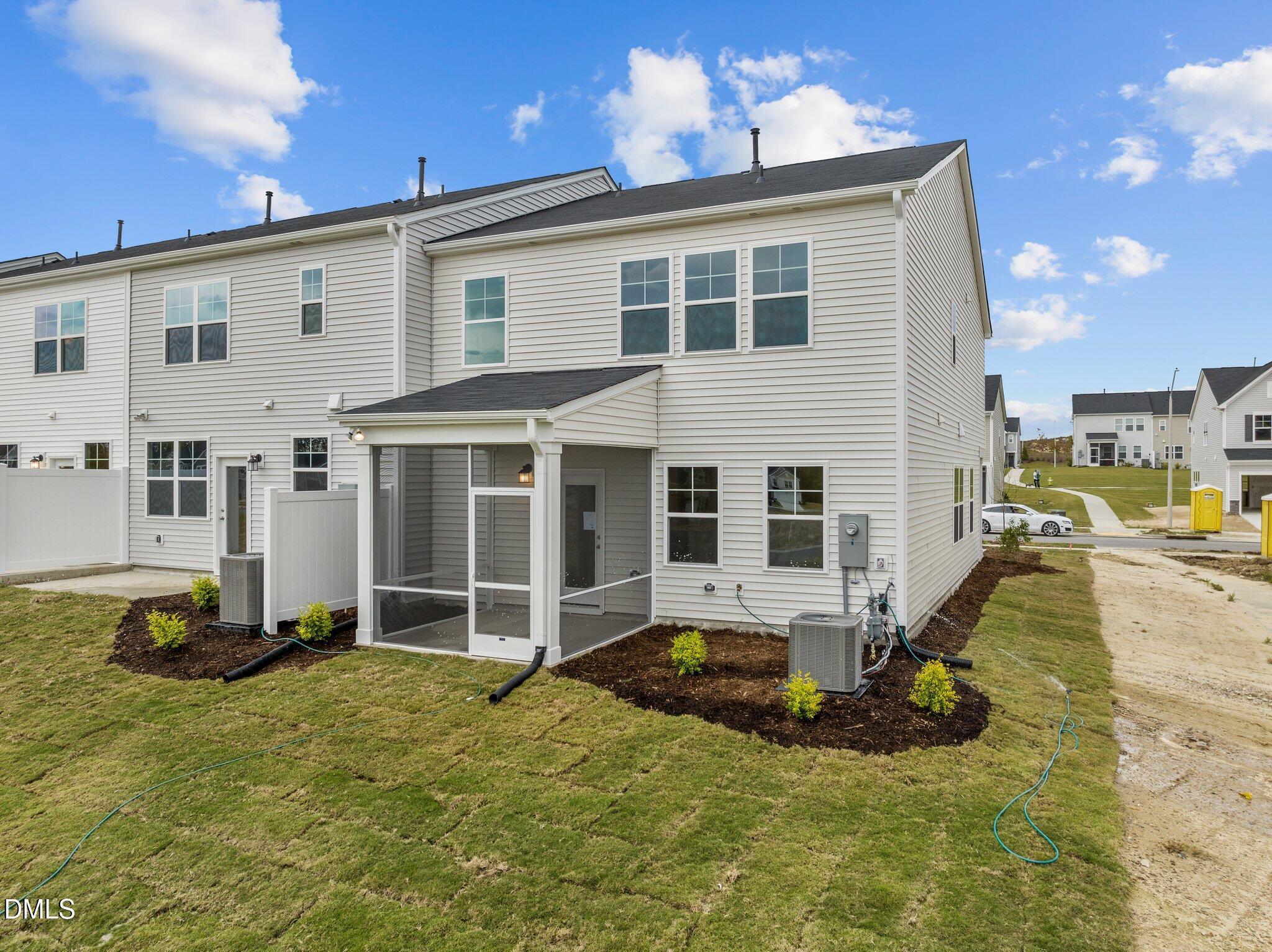 5031 Kota Street Raleigh, NC 27610 - Photo 3 of 84 a front view of a house with a yard