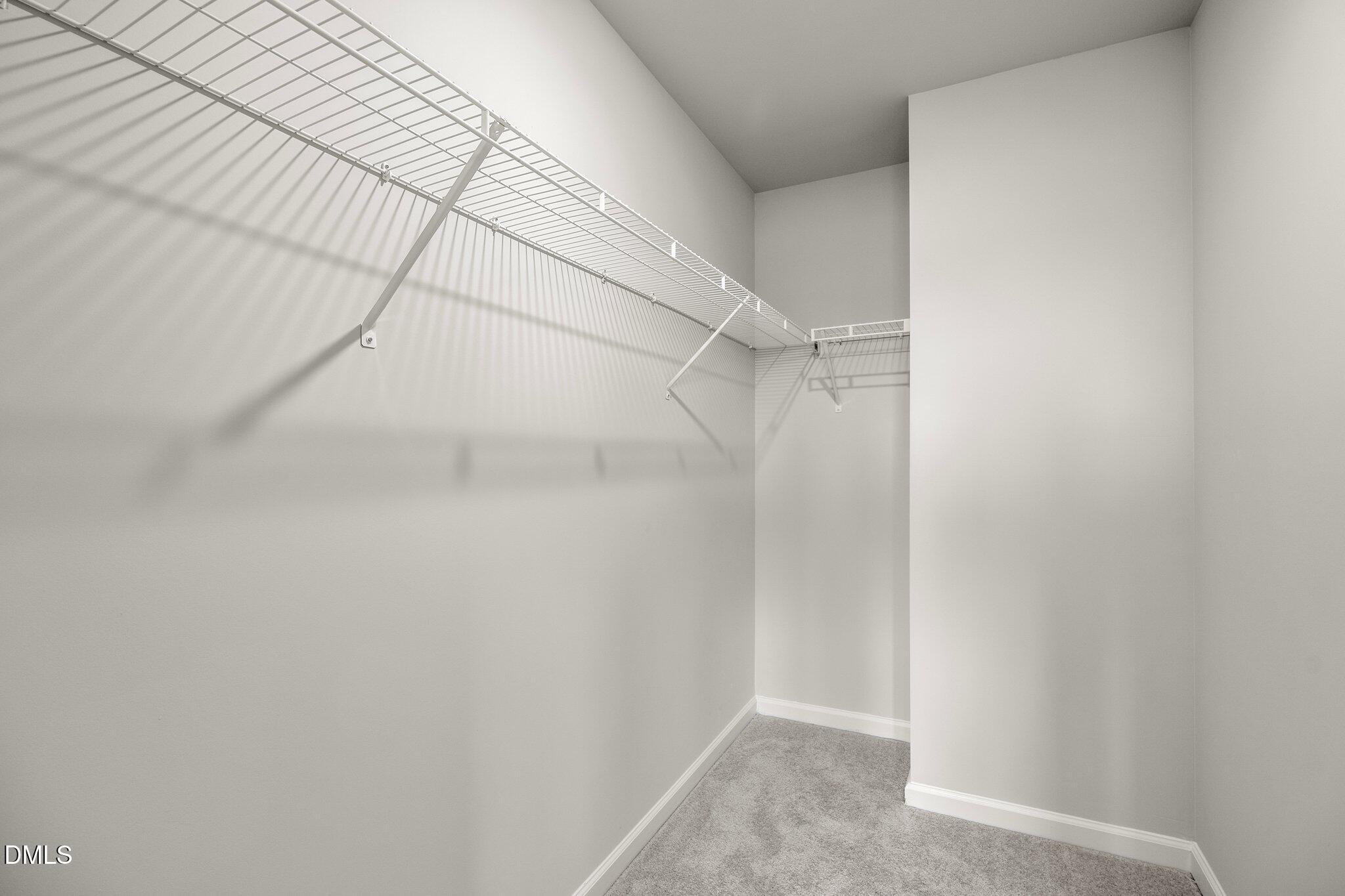 5031 Kota Street Raleigh, NC 27610 - Photo 31 of 84 a view of a room with racks on the wall
