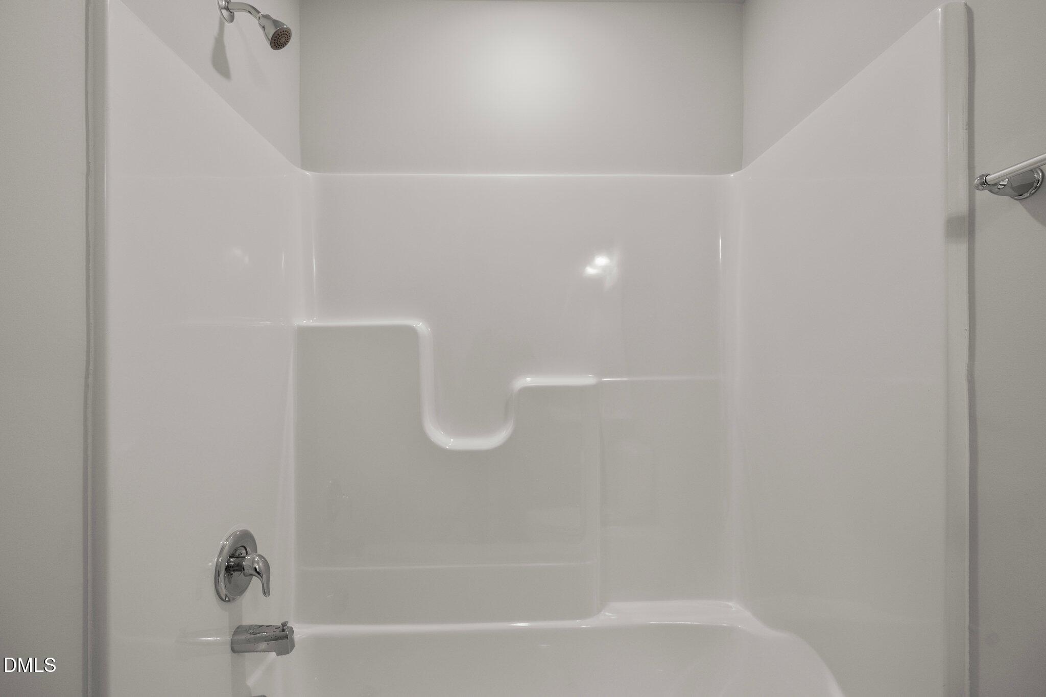 5031 Kota Street Raleigh, NC 27610 - Photo 45 of 84 a bathroom with a shower