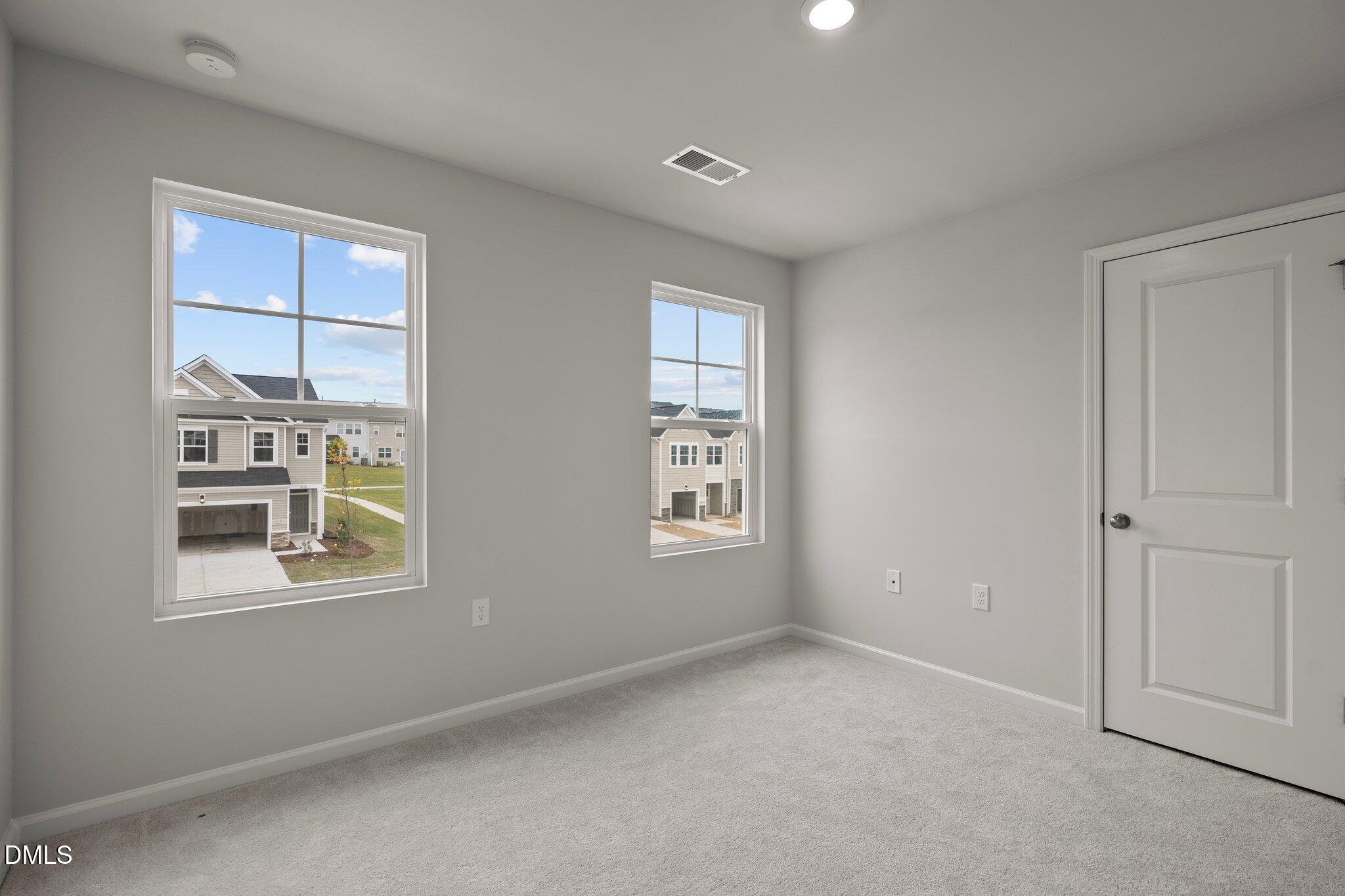 5031 Kota Street Raleigh, NC 27610 - Photo 49 of 84 a view of an empty room with a window