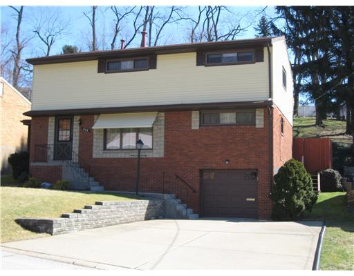 466 Spring Valley Road West Mifflin, PA 15122 - Photo 1 of 18 Exterior Front. EXTREMELY WELL MAINTAINED, NEW CONCRETE CEMENT WORK, NEWER WINDOWS, NEWER GARAGE DOOR