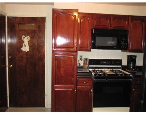 466 Spring Valley Road West Mifflin, PA 15122 - Photo 7 of 18 Kitchen. PANTRY AND DOOR TO ENCLOSED PORCH