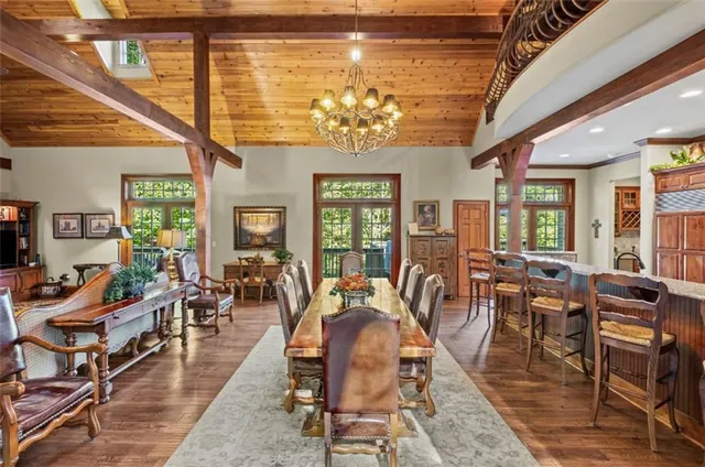 a view of entryway with wooden floor and stairs