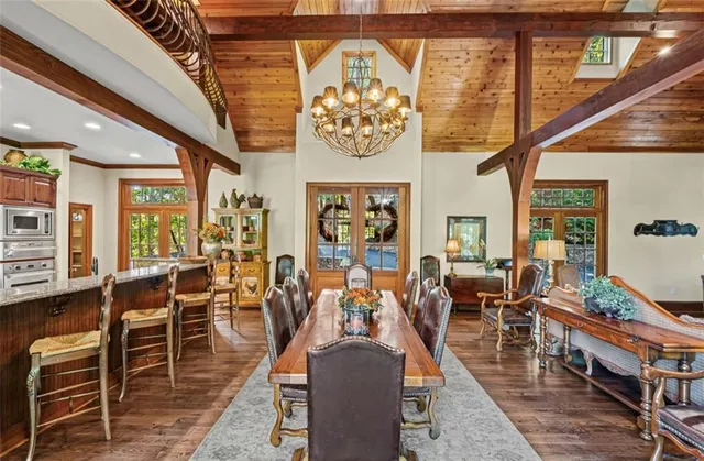 a living room with lots of furniture and a rug