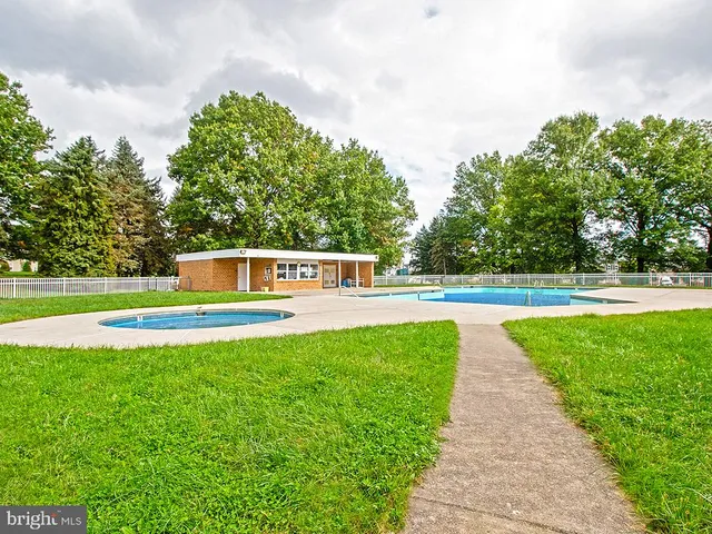 a view of a house with a swimming pool