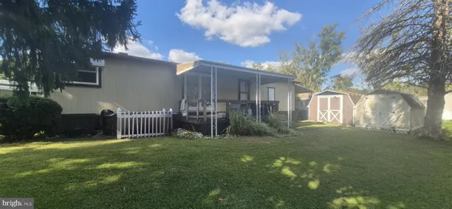 a view of a porch with a yard