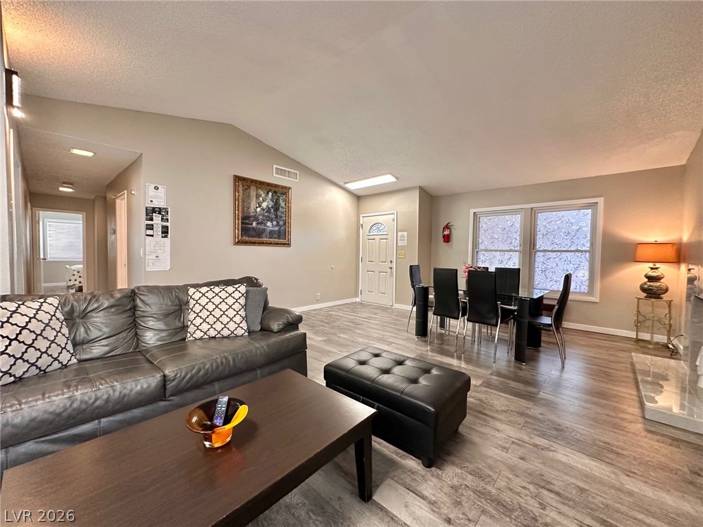 2340 Viewcrest Road Henderson, NV 89014 - Photo 3 of 36 This inviting space offers an open layout, ideal for both entertaining and daily living.
