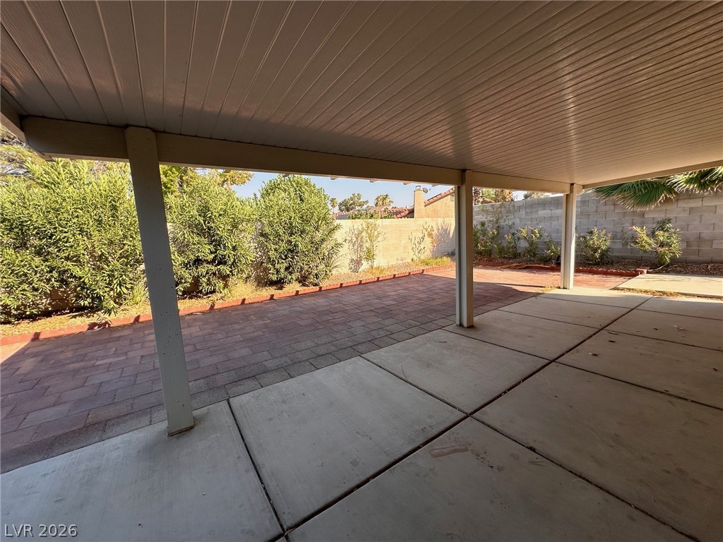 2340 Viewcrest Road Henderson, NV 89014 - Photo 34 of 36 This spacious covered patio offers a refreshing outdoor retreat, perfect for relaxation or entertainment.