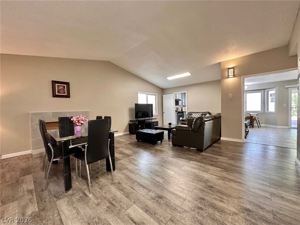 2340 Viewcrest Road Henderson, NV 89014 - Photo 5 of 36 This inviting space features an open layout with elegant flooring and abundant natural light.